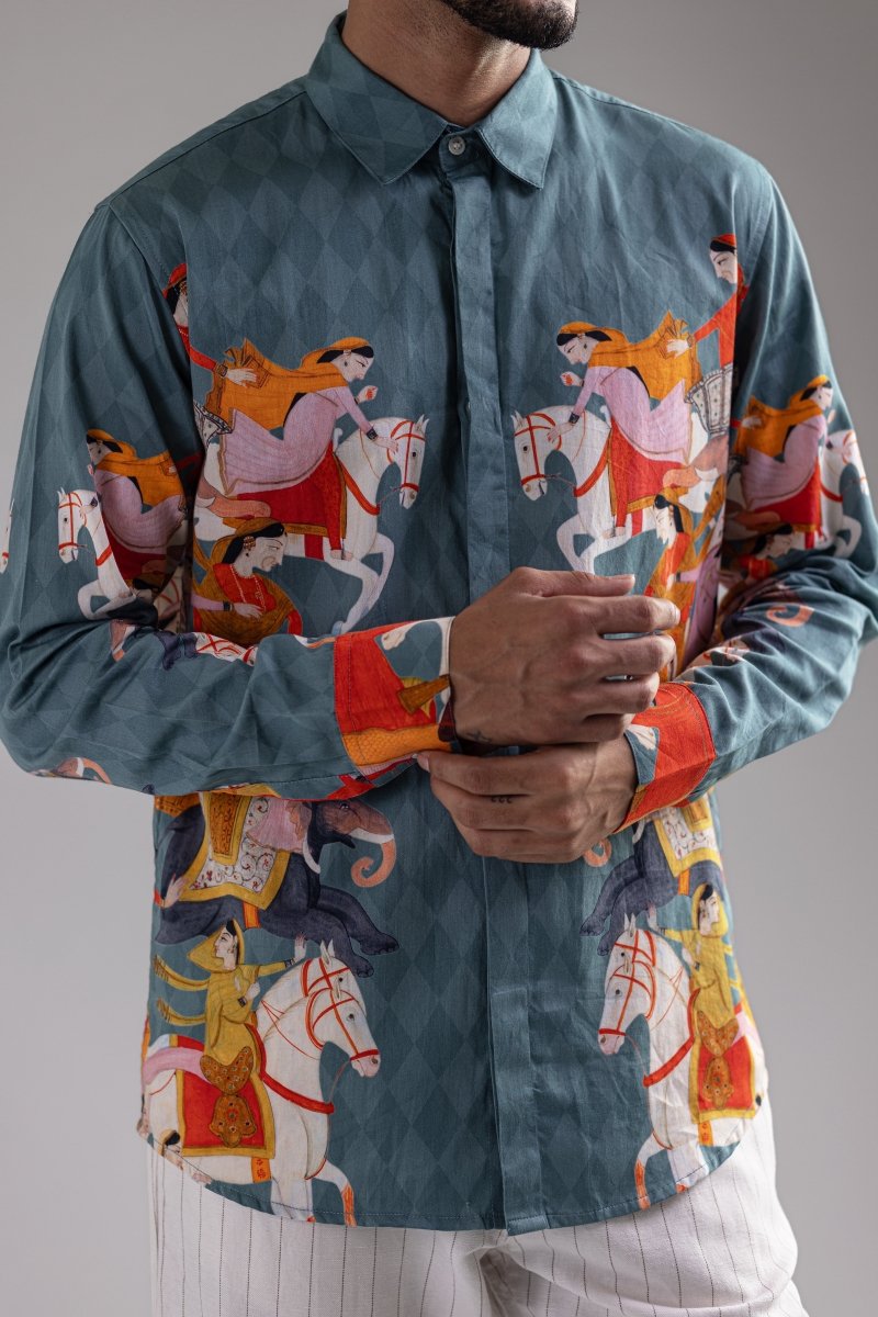 Close front view of the Kirtharjuna shirt, hands clasped