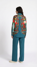 Spring Bloom teal floral cotton shirt worn by model, back view