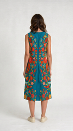 Spring Bloom teal floral cotton dress worn by model, back view